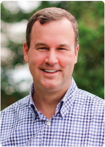 Jeff Hankinson in a Blue and White Shirt Headshot