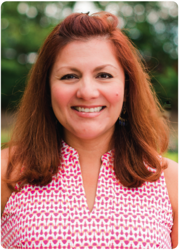 Veronica DeCristoforo in a Pink and White Top Headshot